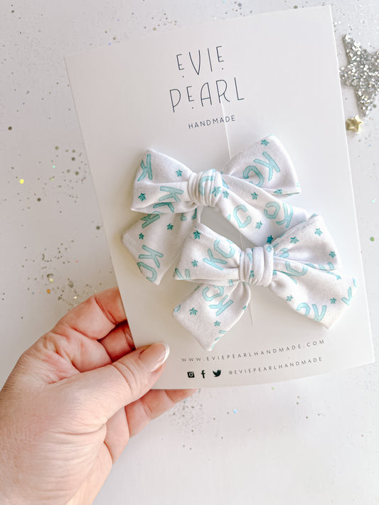 Teal KC Current Small Pinwheel Pigtail Bows