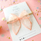 Small Peach Lace Swiss Dot Bow on Nylon Headband