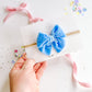 Small Blue Raw Silk Bow on nylon headband