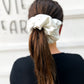 Oversized gray sweatshirt scrunchie styled in messy bun – cozy handmade hair tie for all ages