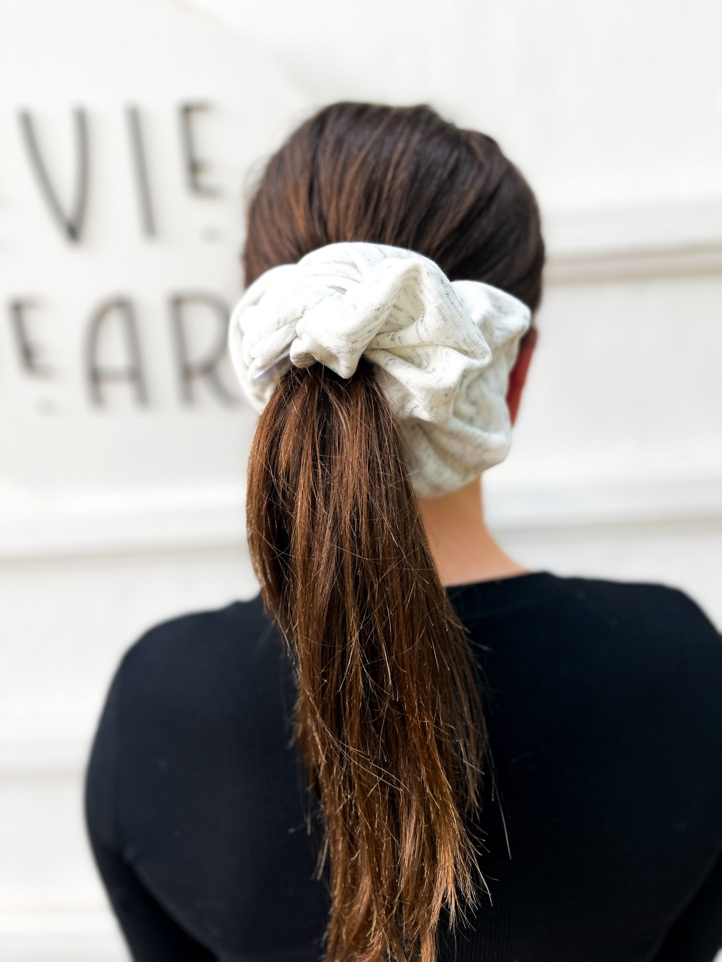 Oversized gray sweatshirt scrunchie styled in messy bun – cozy handmade hair tie for all ages
