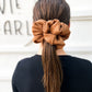 Close-up of chestnut brown ribbed scrunchie – available in regular and oversized sizes for women and girls