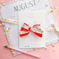 Red Ruler Medium Pinwheel Bow