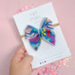 Small Bright Teal Flower Bow On Nylon Headband