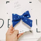 Medium Navy Floral Ribbed Pinwheel Bow