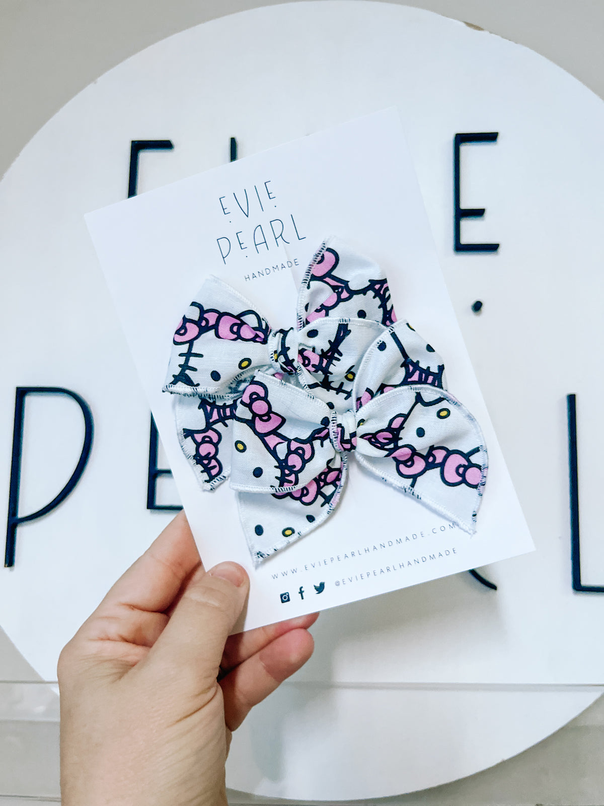 Small hello kitty pigtail bows