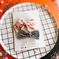 Pink| Orange Star Medium Pinwheel Bow with B&W striped knot bow set