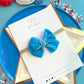 Small Blue Raw Silk Bow on nylon headband