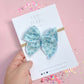 Small Blue Quilt Bow On Nylon Headband