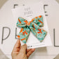 Showgirls large pinwheel bow