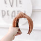 Brown ribbed fabric headband with knotted top – comfortable fall hair accessory for all ages
