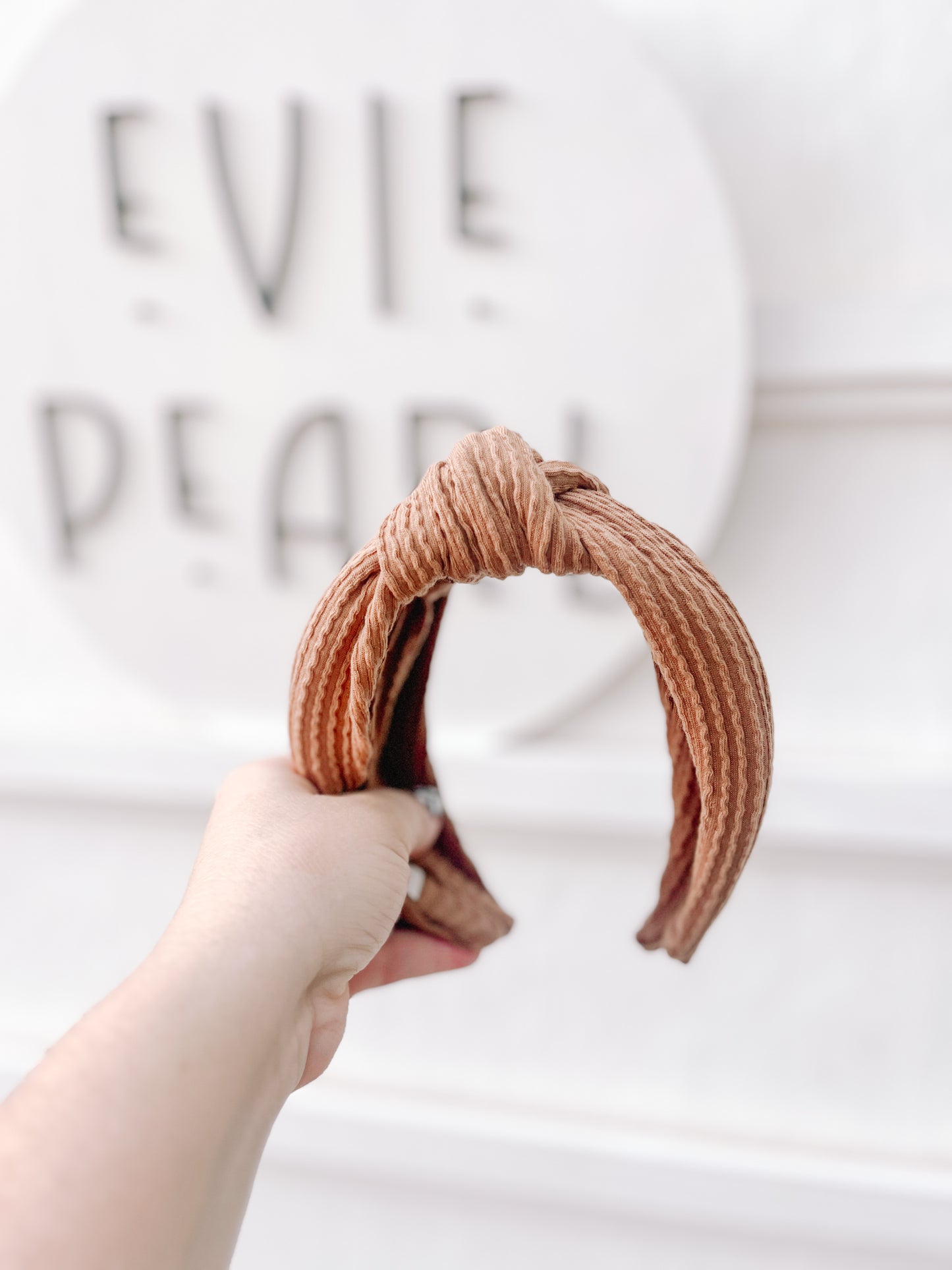 Brown ribbed fabric headband with knotted top – comfortable fall hair accessory for all ages