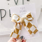 Gold Checkered Longtailed Hair Bow