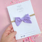 Small Purple Dot Bow On Nylon Headband