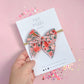 Small Pink Floral Bow On Nylon Headband