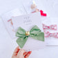 Sage Green Jingle Bell Large Pinwheel Bow