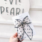 Oversized black sheer daisy flocked bow 5x6 inch handmade hair accessory with right-side alligator clip