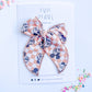 Tan Checkered Medium Bow