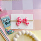 Small Hot Pink Checkered Pinwheel on Nylon Headband