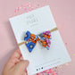 Small Blue/Purple Floral Pinwheel On Nylon Headband