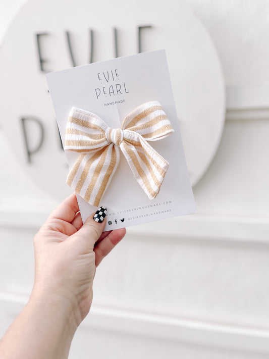 Cream and yellow striped large pinwheel bow: handmade fall neutral hair accessory with right-side alligator clip