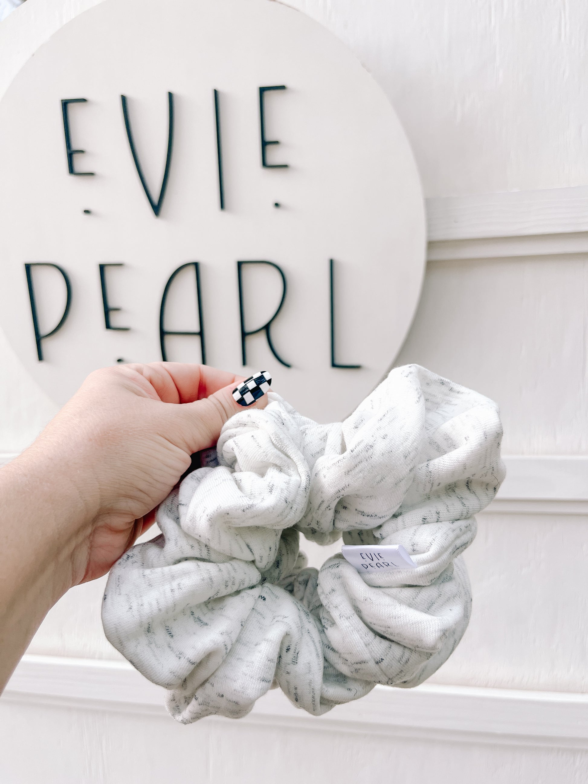 Oversized gray sweatshirt scrunchie styled in messy bun – cozy handmade hair tie for all ages