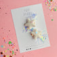White sequin star tinsel pigtail clip set