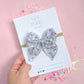 Small Gray Daisy Bow On Nylon Headband