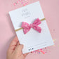 Small Pink Dash Pinwheel On Nylon Headband