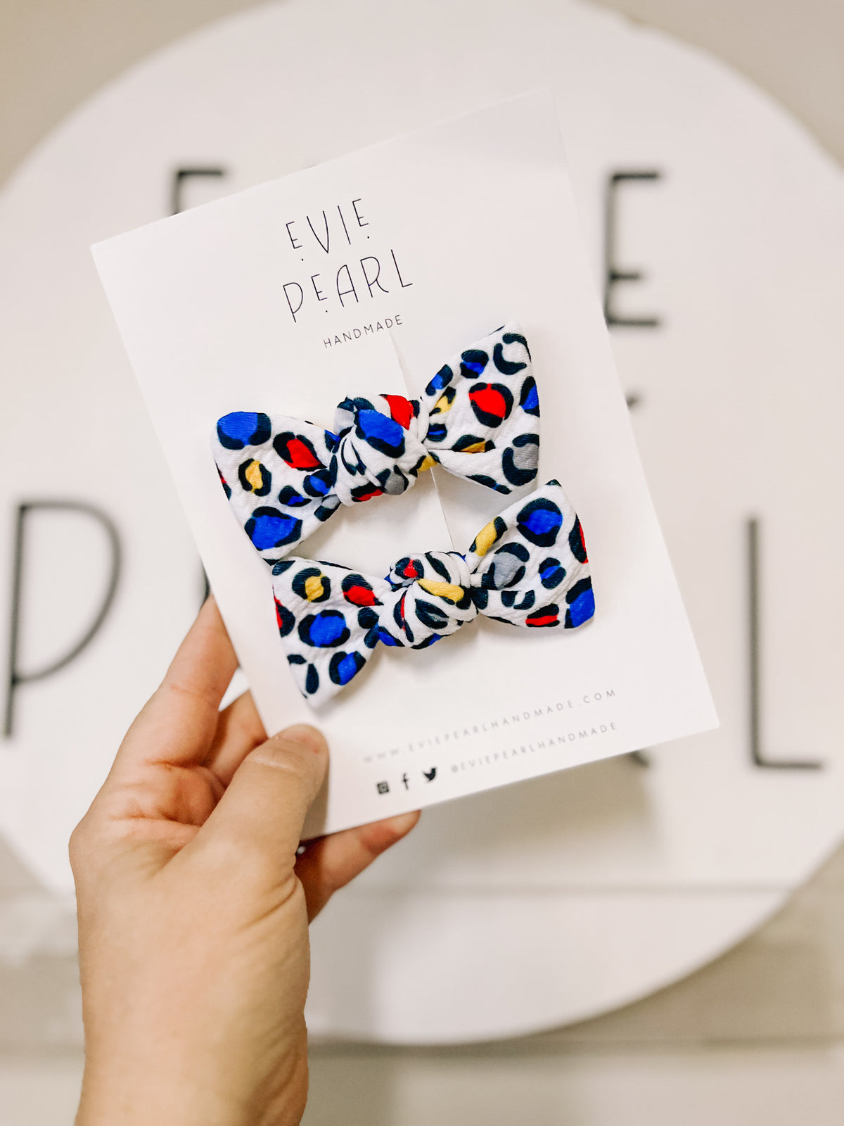 Ku leopard know bow pigtails