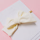 Cream Small Pinwheel Swim Bow