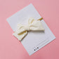 Cream Small Pinwheel Swim Bow