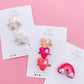 White sequin star tinsel pigtail clip set